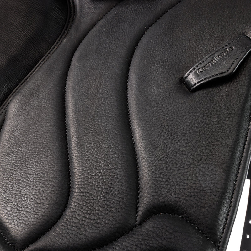 Kavalkade - Dressage Saddle "XENIA" - branded stitching up close 