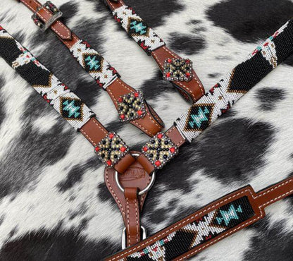 Showman 4 Piece Steer Head Beaded One Ear Headstall and Breast Collar Set - front view on close printed background