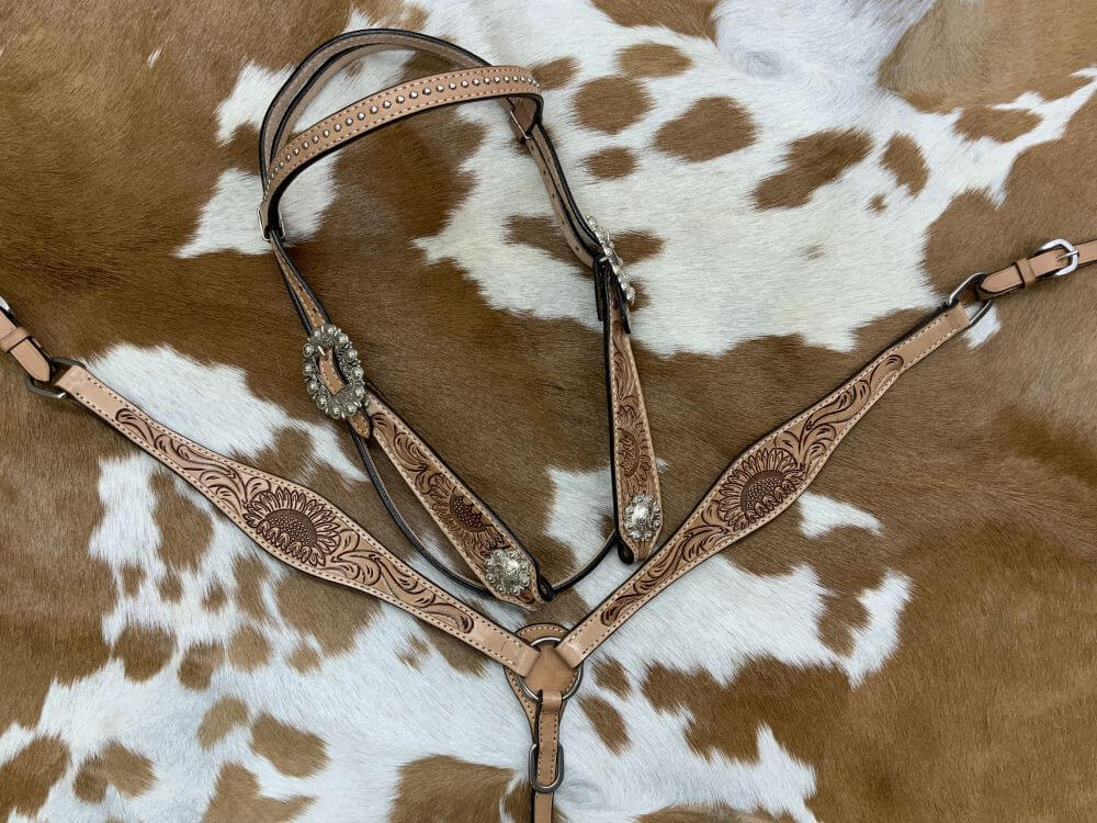 Circle S Barrel Saddle Set with Sunflower Tooling - front view breastcollar set on printed background