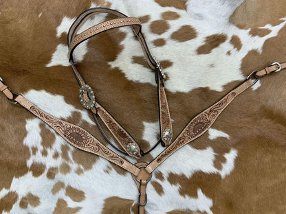 Circle S Barrel Saddle Set with Sunflower Tooling - front view breastcollar set on printed background